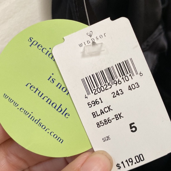 Long black prom dress back has sheer black triangle from legs down to floor - Picture 4 of 4